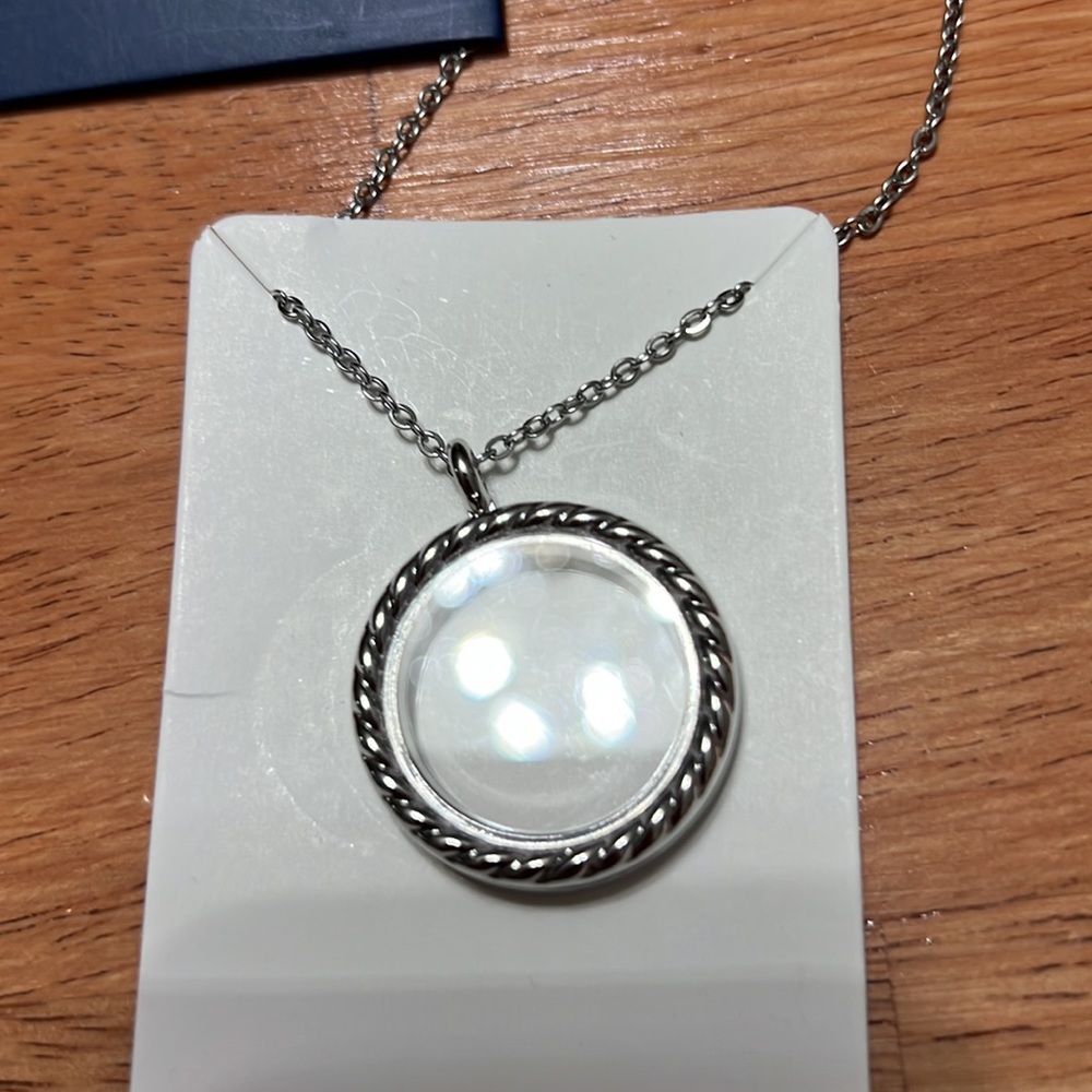 Brand new-never worn EFFY locket. Can get charms through their site.